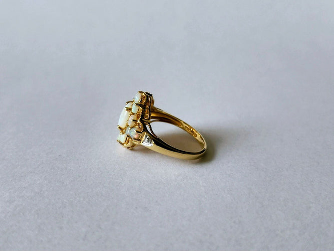 Bague 53 Bague or jaune et opales 58 Facettes
