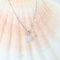 Collier Collier avec pendentif rosette en or blanc 18k et diamants 58 Facettes 159/24R