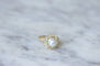 Bague Bague marguerite diamants et perle fine 58 Facettes