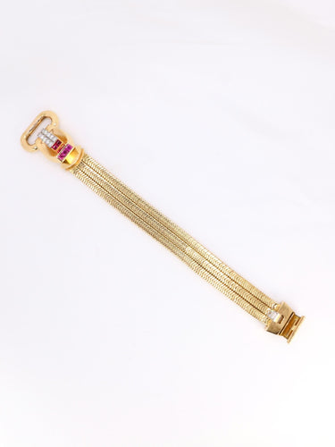 Montre UTI - Montre à secret tubogas or jaune diamants rubis calibrés 58 Facettes 1153.5