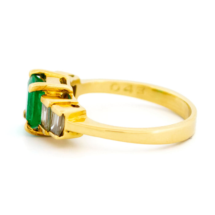 Yellow gold emerald diamond ring