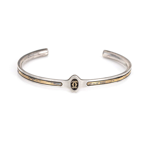 Bracelet CARTIER - Bracelet manchette années 70 en argent et or jaune 58 Facettes G13936