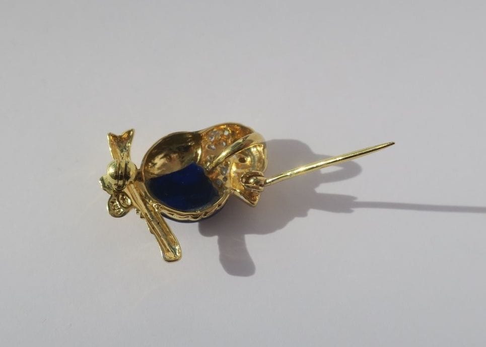 Broche Pendentif et broche oiseau sur branche lapis lazuli diamants 58 Facettes