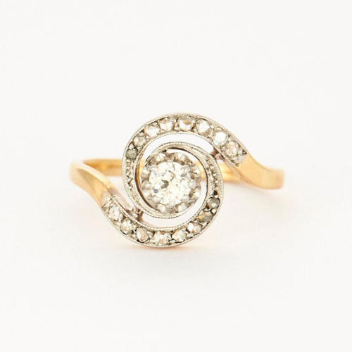 Bague Bague tourbillon en or jaune et platine sertie de diamants 58 Facettes