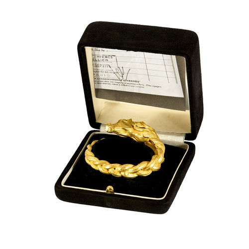 HERMES - Pulseira rígida em ouro amarelo com motivo de cavalo 