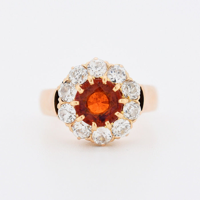 Bague Bague Marguerite Ancienne or, grenat spessartite, diamants Circa 1900 58 Facettes 343