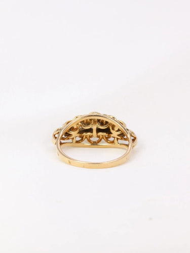 Bague Bague jarretière vintage en or et diamants 58 Facettes J11