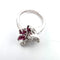 Bague 51 Bague en or blanc avec rubis et diamants 58 Facettes