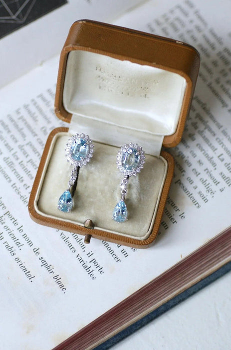 White gold, blue topaz, diamond drop earrings