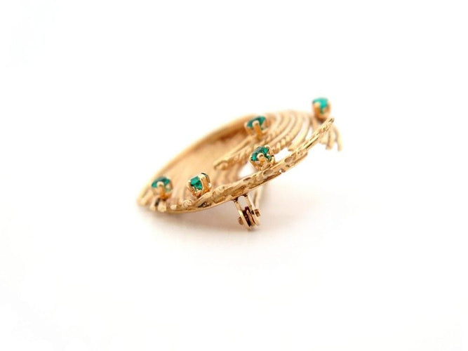 Broche vintage broche epingle tourbillon torsadee or emeraudes 58 Facettes 260447