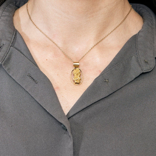 Pendentif Pendentif or jaune pépite d'or 58 Facettes CHOL0868