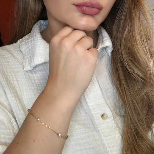 Bracelet Bracelet or jaune et perles 58 Facettes BRA-GS38466