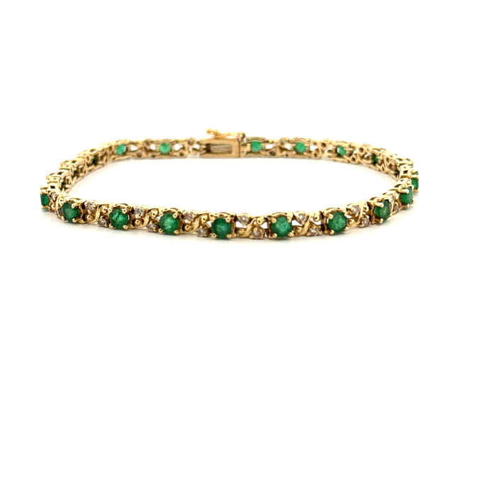 Rivière-Armband aus Gelbgold, Diamanten und Smaragden