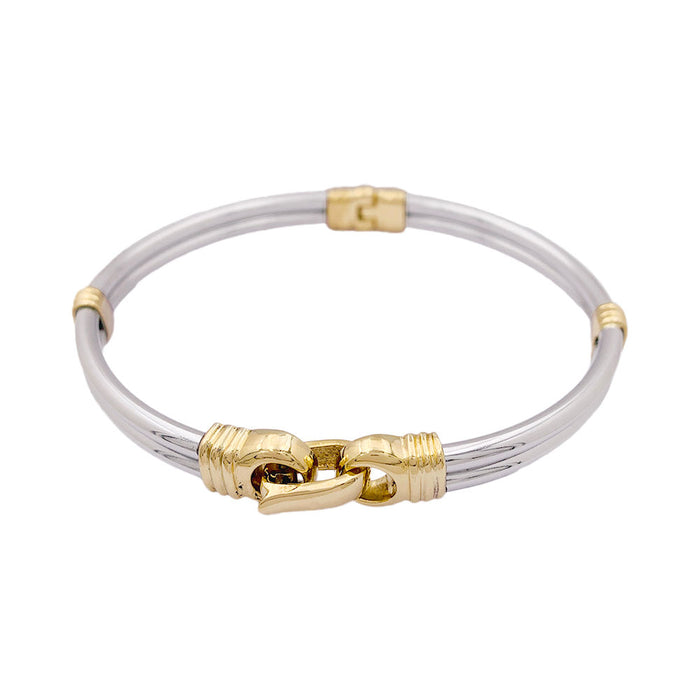 Gold and steel bracelet.