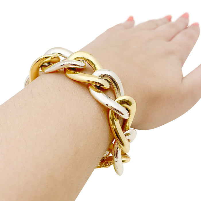 Armband Chaumet, grote schakels in twee tinten goud.