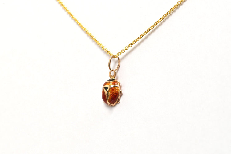 Pendentif Pendentif années 70 or jaune serti d'émail 58 Facettes 21640