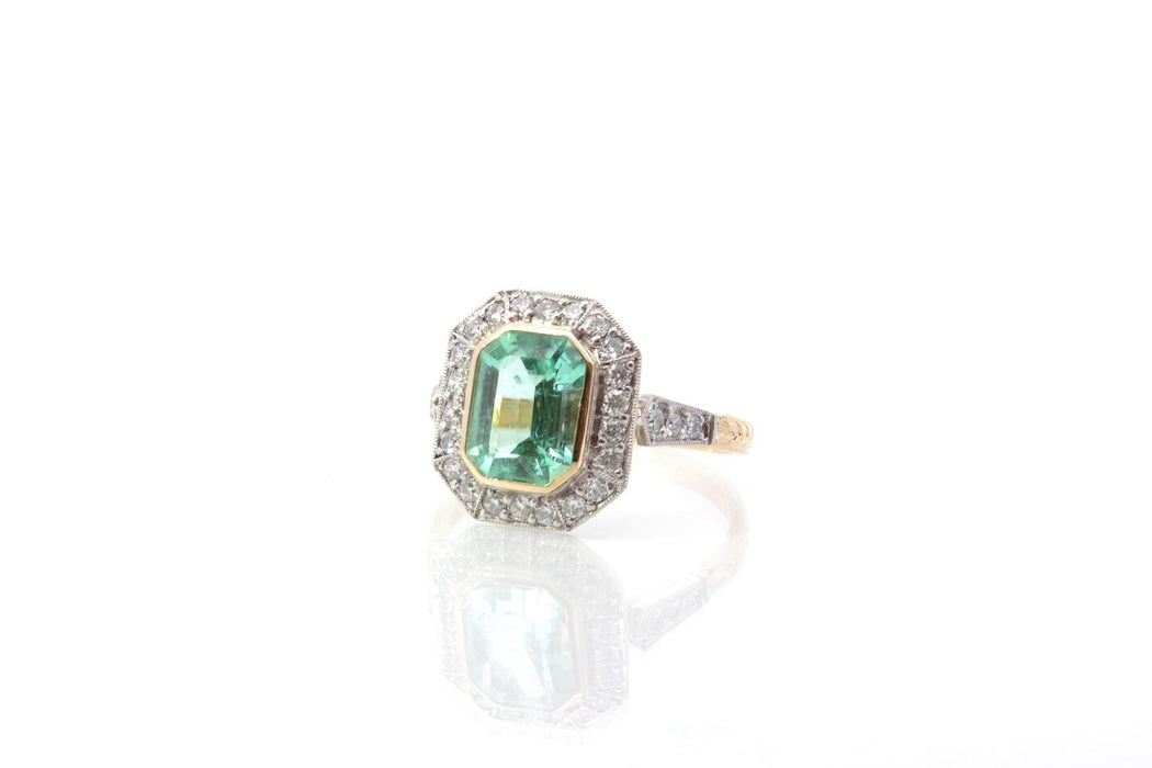 Anello certificato con diamante e smeraldo colombiano