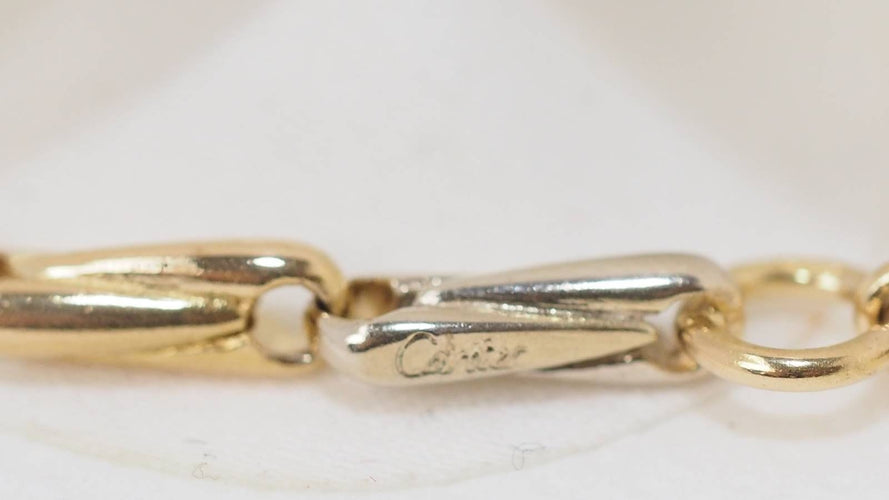 Collier Collier Sautoir Cartier en or jaune grain d' avoine 58 Facettes 32383