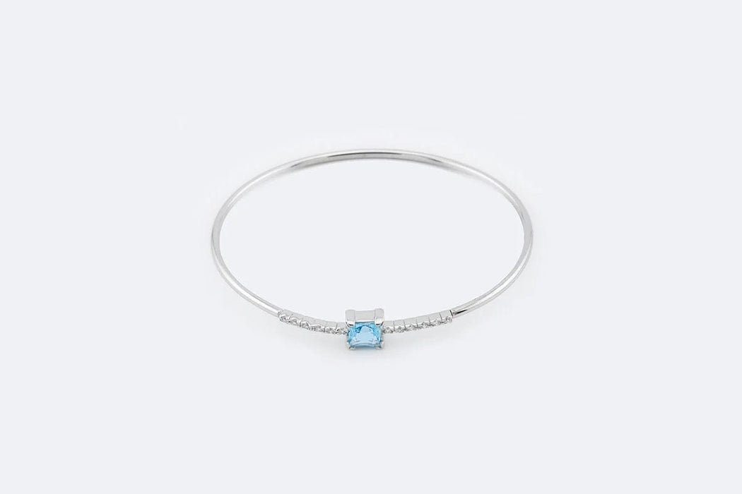 Bracelet Bracelet rigide en or blanc avec topaze bleue et zircons 58 Facettes 197,00 BRC