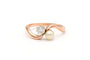 Bague 56 Bague en or rose sertie d'une perle et d'un diamant 58 Facettes B568
