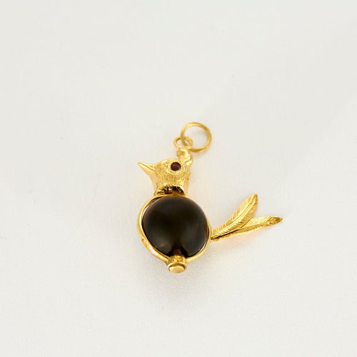 Pendentif Pendentif oiseau en or jaune et oeil de tigre 58 Facettes PAL30434