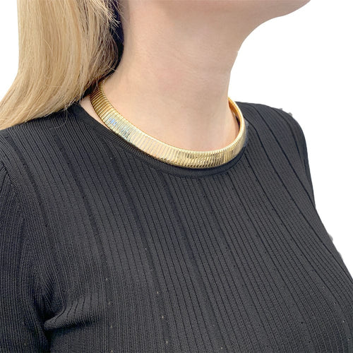 Collier Collier Bulgari vintage, "Tubogas", or jaune, acier. 58 Facettes 34085