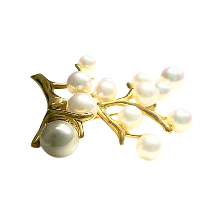 Spilla in oro con perle