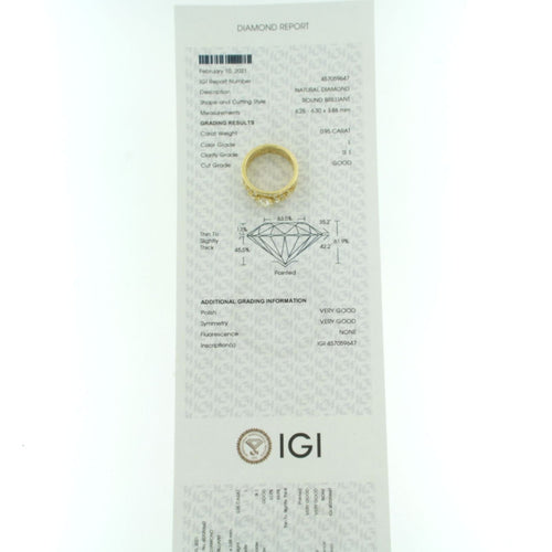 Pierścionek z żółtego złota z diamentami o szlifie brylantowym 