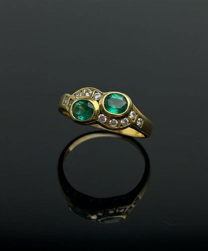 Bague Bague sinueuse ornée d'émeraudes et de diamants 58 Facettes