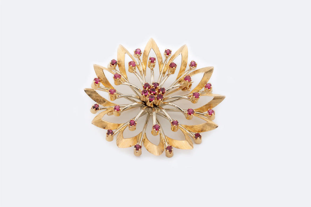 Broche flor de oro amarillo con rubí
