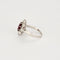 Bague 52 Bague marguerite platine et or blanc, rubis et diamants 58 Facettes