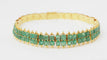 Bracelet Bracelet souple ancien en or jaune et émeraudes 58 Facettes 32752