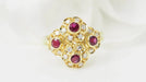 Bague 50 Bague marguerite en or jaune rubis et diamants 58 Facettes 32803