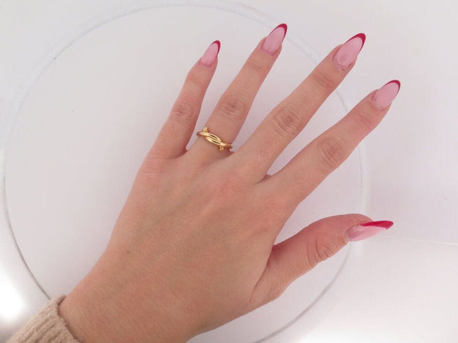 Bague 50 bague CARTIER entrelaces en or jaune 58 Facettes 264060