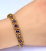 Bracelet Bracelet en or jaune orné de 20 saphirs de Ceylan 58 Facettes AB425