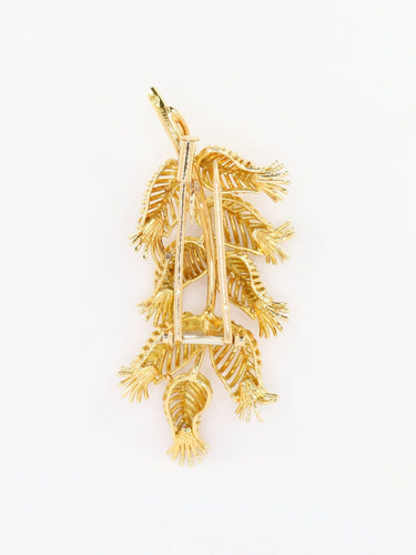 Broche GUBELIN Broche feuille or rubis émeraudes 58 Facettes 1126.1