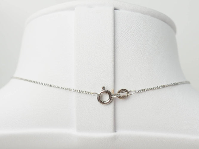 Collier Collier solitaire en or blanc et saphir ovale 58 Facettes 19367