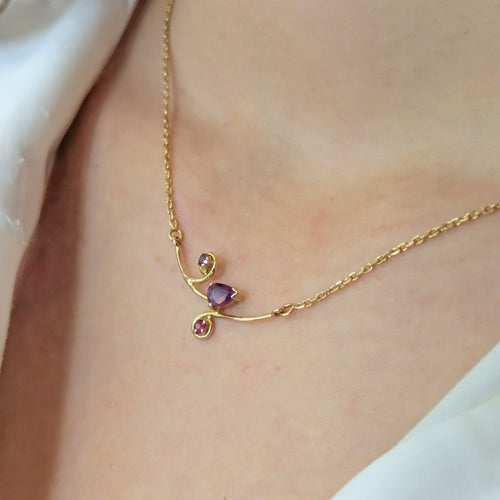 Collier Collier en or jaune  et rubis 58 Facettes 32891