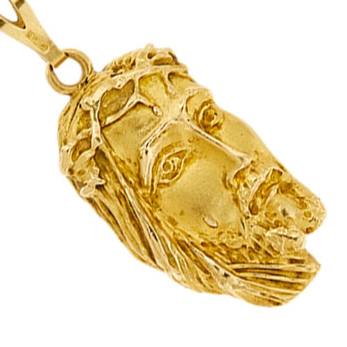 Pendentif Pendentif en or jaune avec visage du Christ 58 Facettes 36598