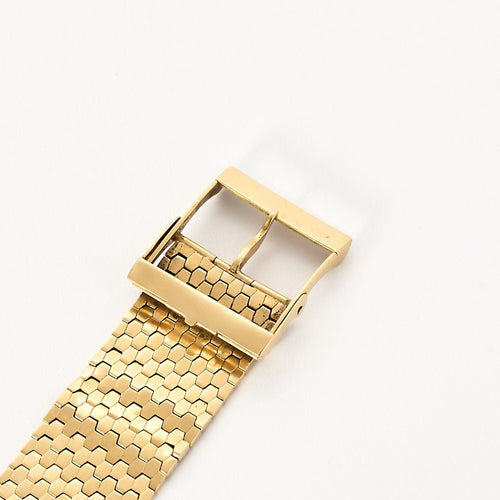 Beltearmbånd i gult gull 