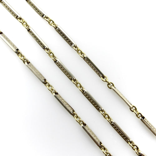 Montre Chaîne de montre Art Déco bicolore en or 10 carats avec fermoir mousqueton et anneau à ressort en or 14 carats 58 Facettes A20057