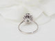 Bague 50.5 Bague marguerite en or blanc, diamants et saphir ovale 58 Facettes 26804