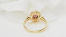 Bague 51.5 Bague marguerite en or jaune, grenat et diamants 58 Facettes 32814