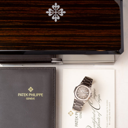 Pendentif Patek Philippe Nautilus Or Blanc 58 Facettes