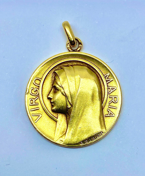 Medalla de oro amarillo que representa el Virgen María, firmado G. Rabier