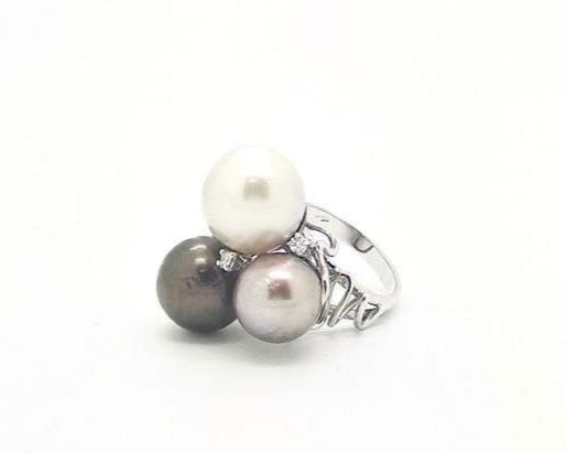 Bague bague en or blanc avec perles et diamants 58 Facettes