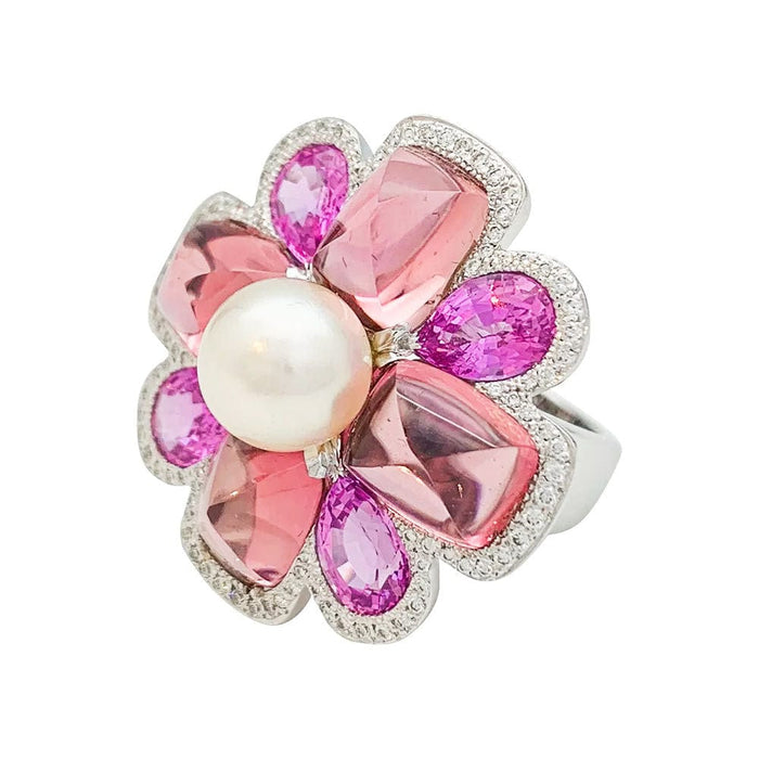 Bague 52 Bague Chanel, "San Marco", or blanc, perle, saphirs roses, tourmalines roses, diamants. 58 Facettes 34030