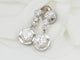 Boucles d'oreilles Dormeuses anciennes en or blanc et diamants 58 Facettes 32108 O