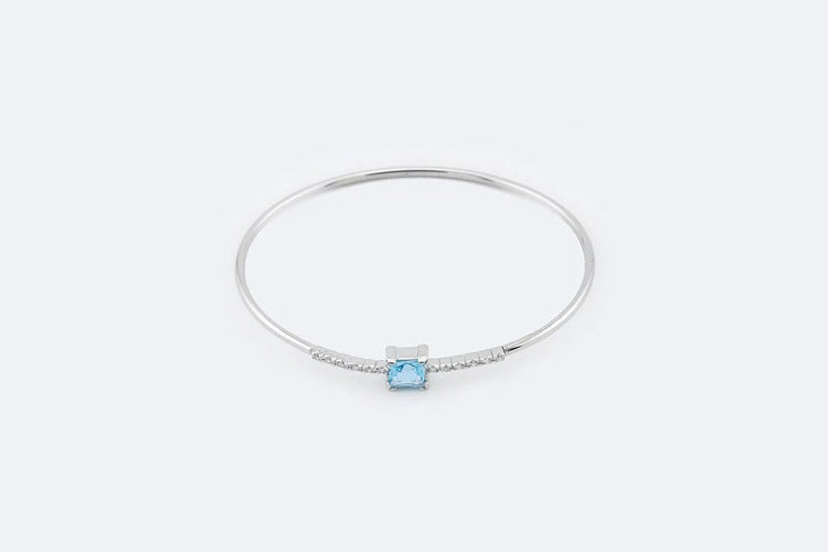Bracelet Oro Bianco Bracciale rigido in oro bianco con topazio azzurro e zirconi 58 Facettes 197,00 BRC