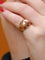 Bague Bague boule vintage en or jaune, rubis et diamants 58 Facettes J134